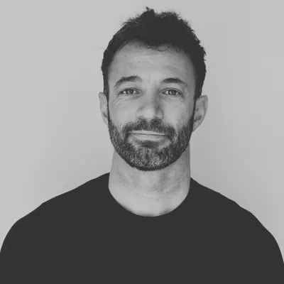 Chris Davison, founder of Pal, in a black and white portrait